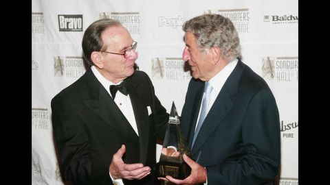 David, left, greets singer Tony Bennett after he was honored with the  Towering Performance Award  Tony at the Annual Songwriters Hall of Fame Awards ceremony in June 2003 New York City. 