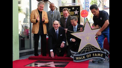 From left to right: Steve Tyrell, an unidentified guest, Paul Williams, and Leron Gubler pose with David after he was honored with his Hollywood star.