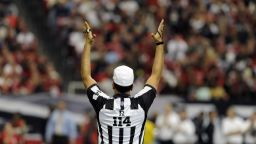 ATLANTA - NOVEMBER 9: NFL referee Gene Steratore signals a score as the New Orleans Saints host the Atlanta Falcons at the Georgia Dome on November 9, 2008 in Atlanta, Georgia. (Photo by Al Messerschmidt/Getty Images)