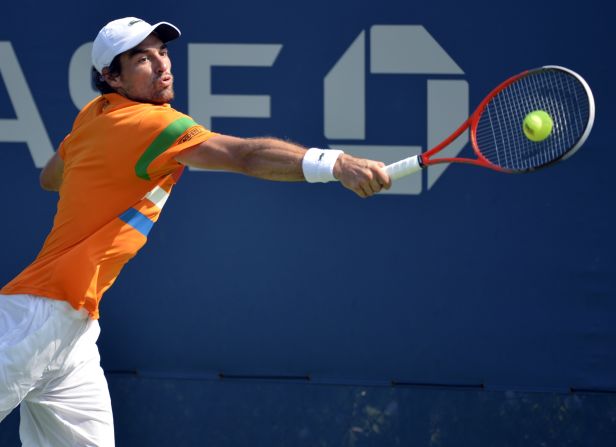 Frenchman Jeremy Chardy stretches to make a return against Slovakia's Martin Klizan.