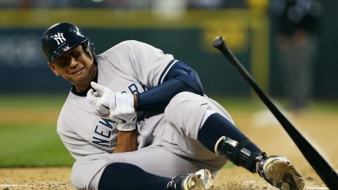New York Yankee Alex Rodriguez falls to the ground after being hit by a pitch by Seattle Mariner Felix Hernandez on July 24.