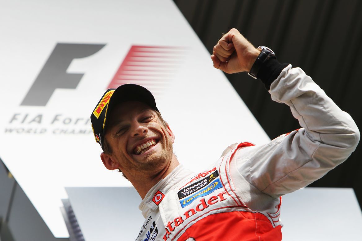A delighted Jenson Button was left to celebrate his 14th F1 career victory after a superb performance in the Belgian GP. 