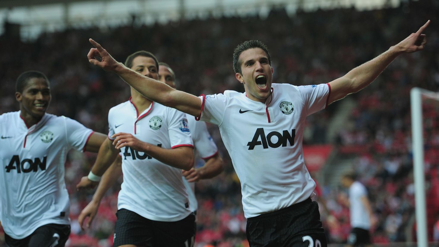 Robin van Persie celebrates the winning goal and his hat-trick in Manchester United's 3-2 win at Southampton. 