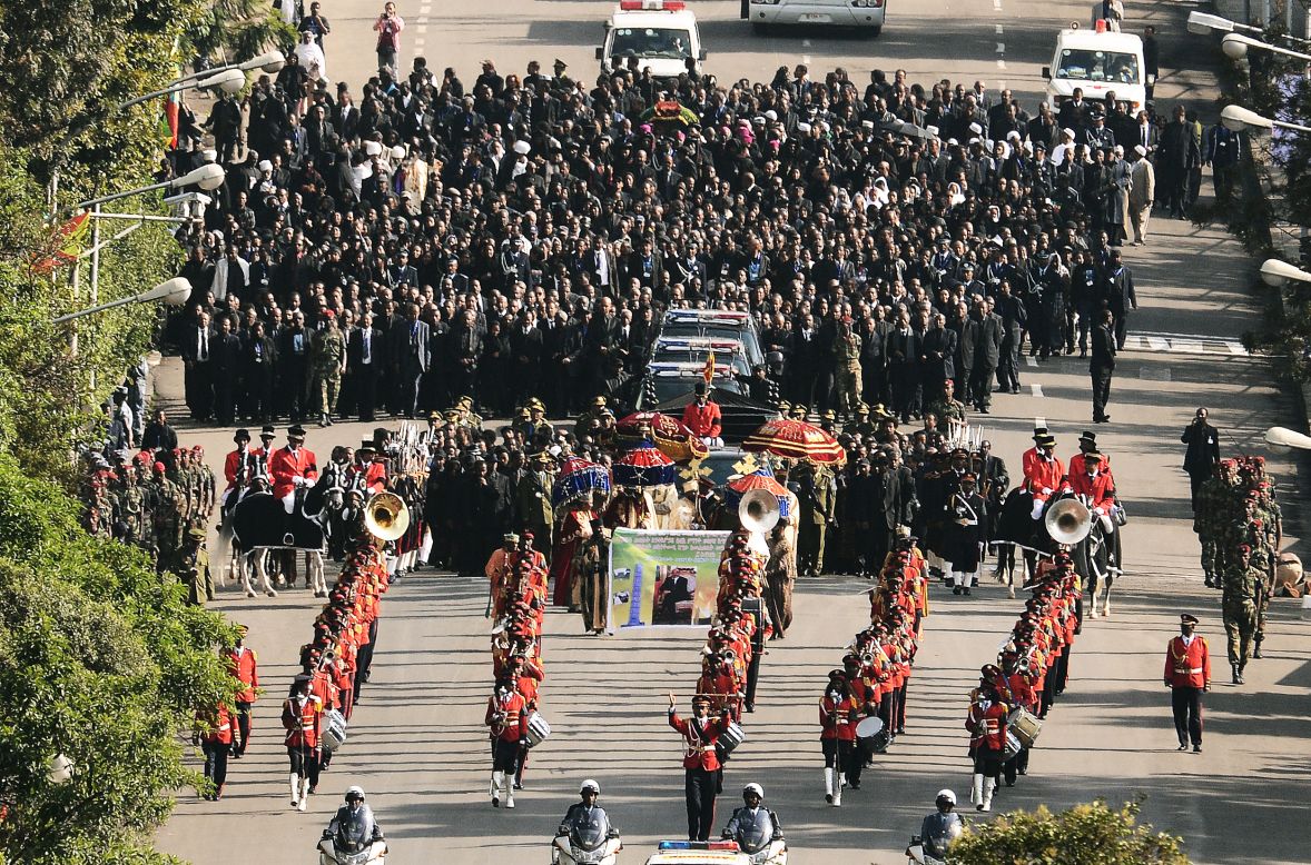 Hundreds of mourners followed the coffin through the Ethiopian capital.