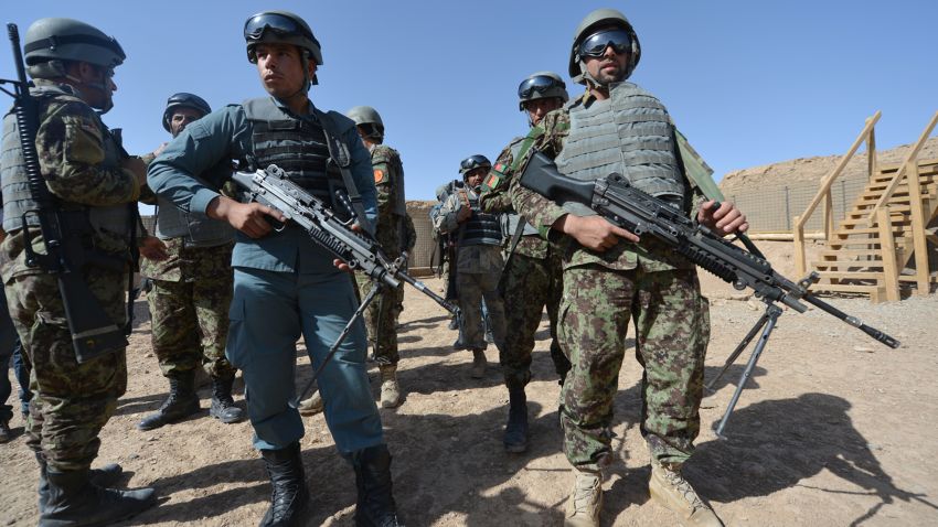 Members of Afghanistan police and military attend a tactical officer course training by U.S. Marines in Helmand Province in June.
