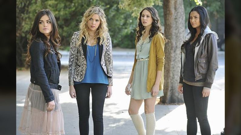 "(Here) you have Aria's (from left) vintage rock-and-roll ... Hanna's high-end glam with her famous pops of color, you have the softness of Spencer ... and my sexy, tough and modern Emily," costume designer Mandi Line said. "Aria is my fantasy doll, Hanna is my high school me, Spencer is who I learn from the most, and Emily comes the most natural to me."