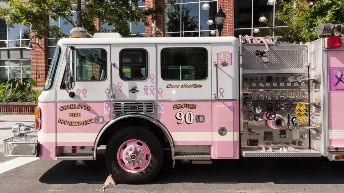 The Engine 90 firetruck, also known as the Pink Lady, parks outside of the convention center Sunday. The reserve truck honors the first woman to serve in the Charlotte Fire Department, who died of breast cancer.