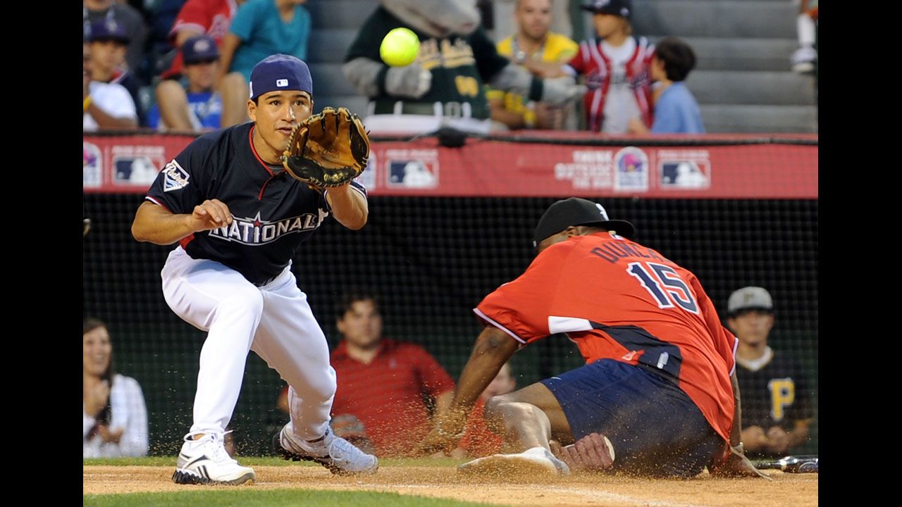 Mario Lopez and Duncan play in the 2010 MLB All Star Celebrity Softball Game in Anaheim, California.