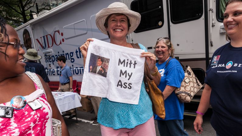 Lynn Hinkle of Missouri holds up a pair of shorts on Monday mocking Republican presidential candidate Mitt Romney.