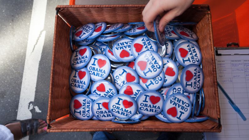 Buttons sold Monday show support for the Affordable Care Act, also known as Obamacare.