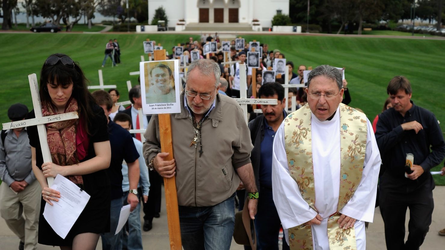 Javier Sicilia leads a 50-cross procession at Loyola Marymount University, each cross representing 1,000 cartel murder victims.