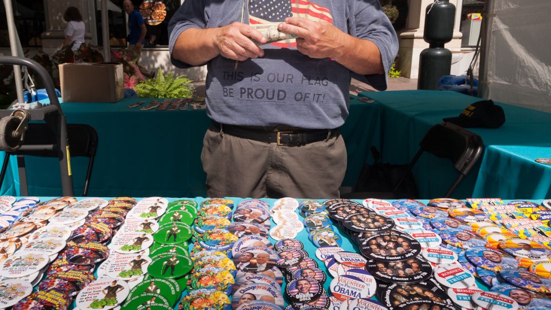 A man sells buttons supporting President Barack Obama on Monday.