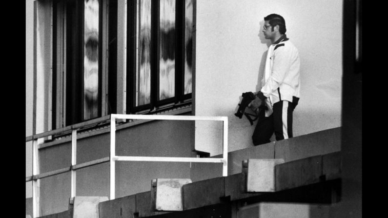 A German policeman leans against a wall outside an apartment where Israeli hostages are held, Munich, September 1972. <a href="index.php?page=&url=http%3A%2F%2Flife.time.com%2Fhistory%2Fmunich-massacre-1972-olympics-photos%2F" target="_blank" target="_blank">See the complete gallery on LIFE.com</a>.