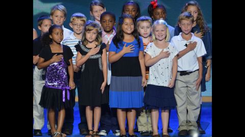 The third-grade class from W.R. O'Dell Elementary School in Concord, North Carolina, recites the Pledge of Allegiance.