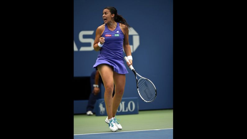 France's Marion Bartoli reacts to a point against Maria Sharapova of Russia on Wednesday.