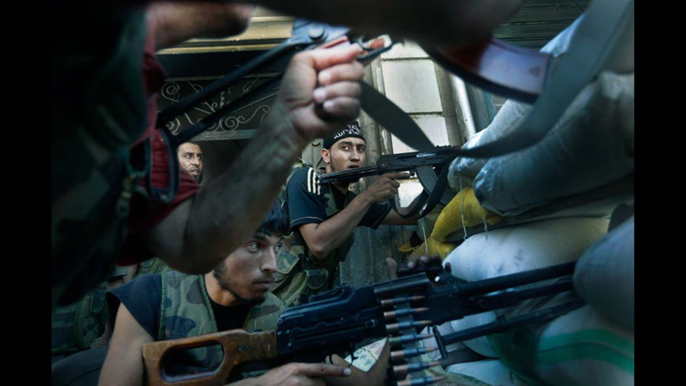 Members of the rebel army fight back against forces loyal to al Assad's regime.