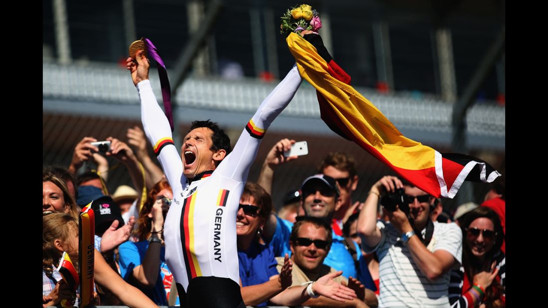 Michael Teuber of Germany celebrates winning the men's individual C 1 time trial on Wednesday.