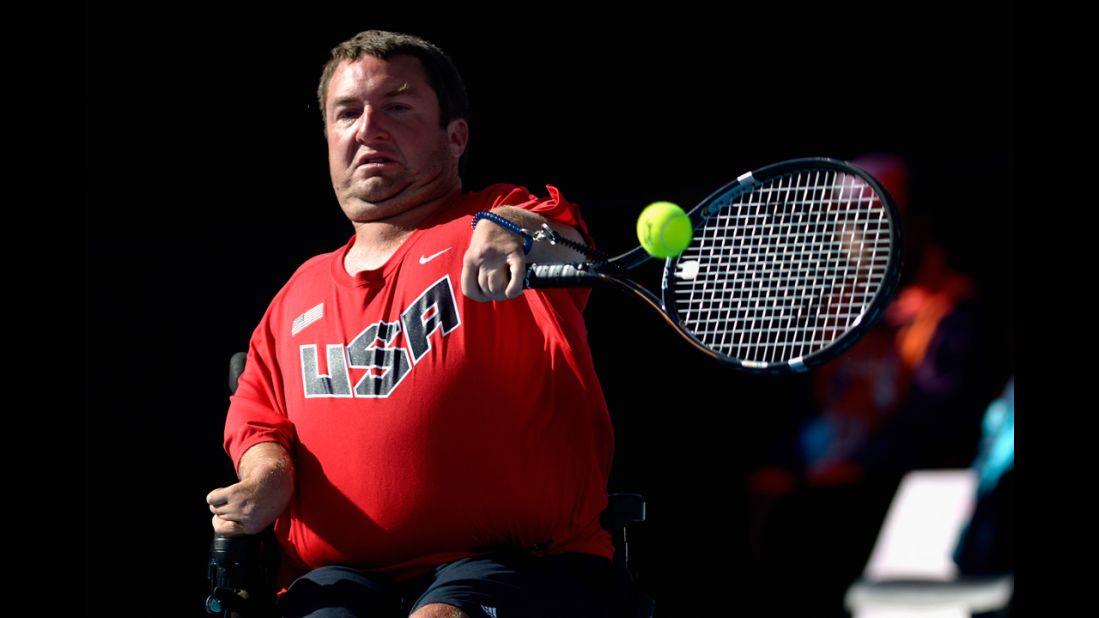 Nicholas Taylor of the United States plays a forehand in the quad doubles wheelchair tennis final on Wednesday.