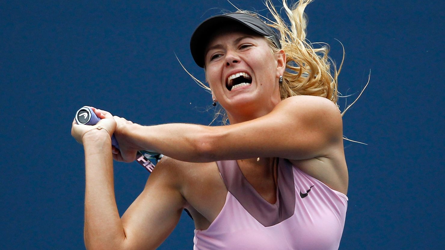 Maria Sharapova turns up the heat during her quarterfinal victory over Marion Bartoli at the U.S. Open. 