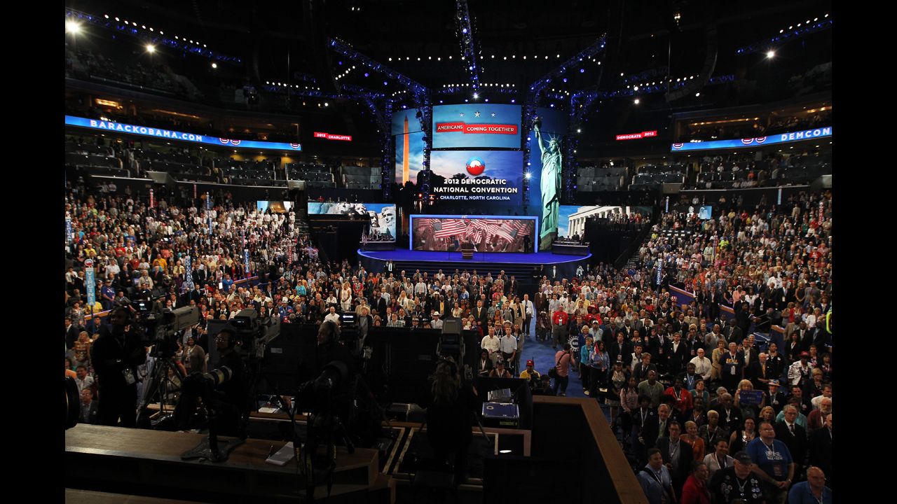 People pose during the official convention photography during Day 2 of the Democratic National Convention at Time Warner Cable Arena on Wednesday.