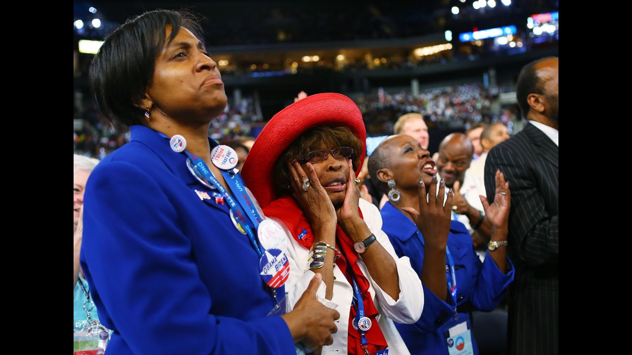 A woman reacts as Missouri Rep. Emanuel Cleaver II, chair of the Congressional Black Caucus, speaks on Wednesday.