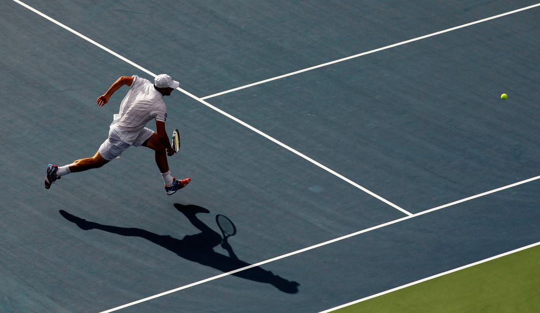 Roddick chases down the ball during his match against del Potro on Wednesday. Roddick announced he would retire after this Grand Slam.