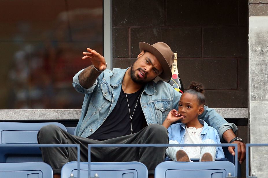 NBA basketball player Tyson Chandler and his daughter Sacha-Marie attend the U.S. Open on Wednesday.