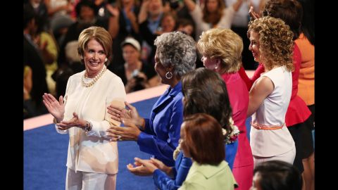 Pelosi and other female members of Congress applaud on Tuesday.