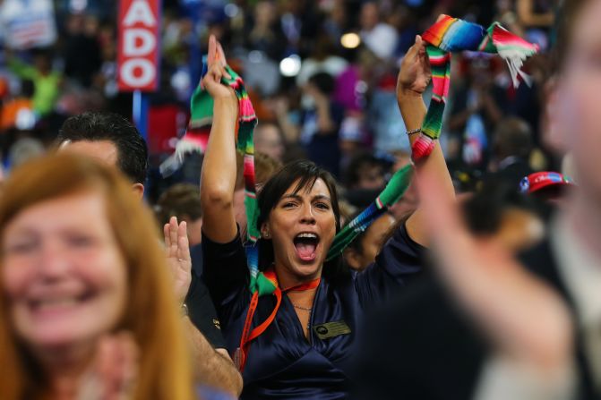  A woman cheers during Tuesday's program.