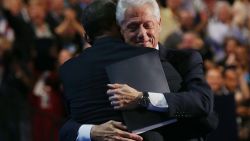 CHARLOTTE, NC - SEPTEMBER 05: U.S. President Bill Clinton hugs Democratic presidential candidate, U.S. President Barack Obama (L) on stage during day two of the Democratic National Convention at Time Warner Cable Arena on September 5, 2012 in Charlotte, North Carolina. The DNC that will run through September 7, will nominate U.S. President Barack Obama as the Democratic presidential candidate. (Photo by Justin Sullivan/Getty Images) 