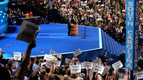 The crowd cheers as Bill Clinton makes his case Wednesday for the re-election of Barack Obama.