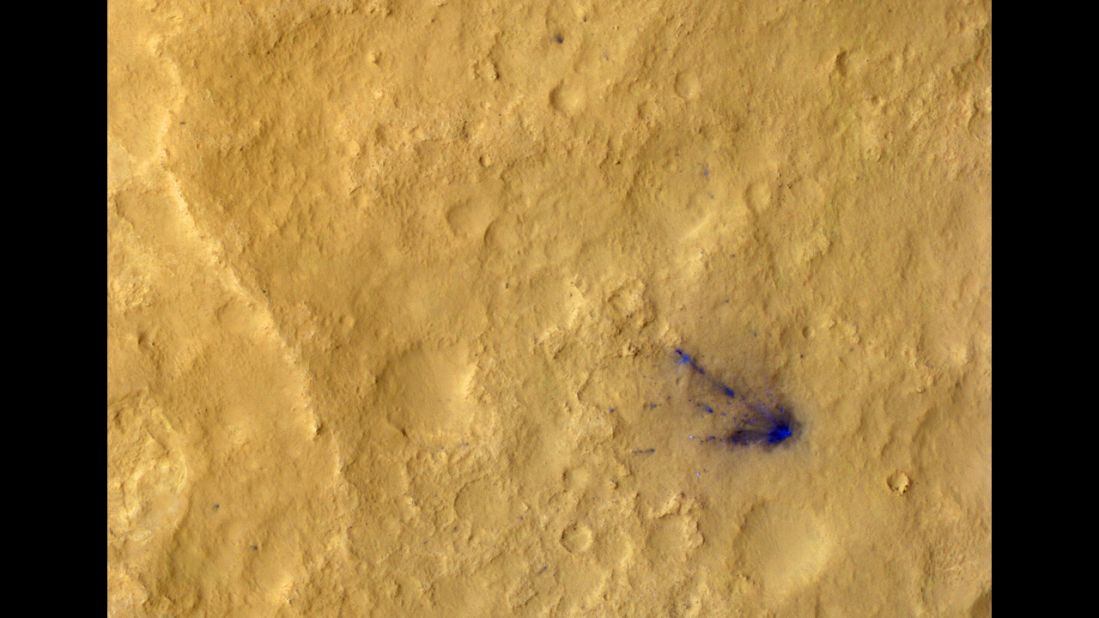 Sub-image three shows the descent stage crash site, now in color, and several distant spots (blue in enhanced color) downrange that are probably the result of distant secondary impacts that disturbed the surface dust.