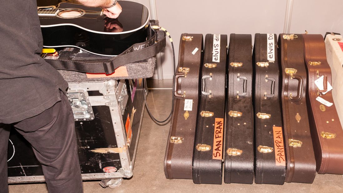 Guitars are tuned Thursday for the band Foo Fighters, which will perform the final night of the convention.