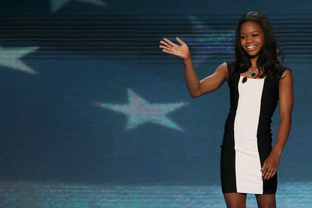 Olympic gymnast Gabby Douglas waves after leading the Pledge of Allegiance during the Democratic National Convention in Charlotte, North Carolina, on Wednesday.
