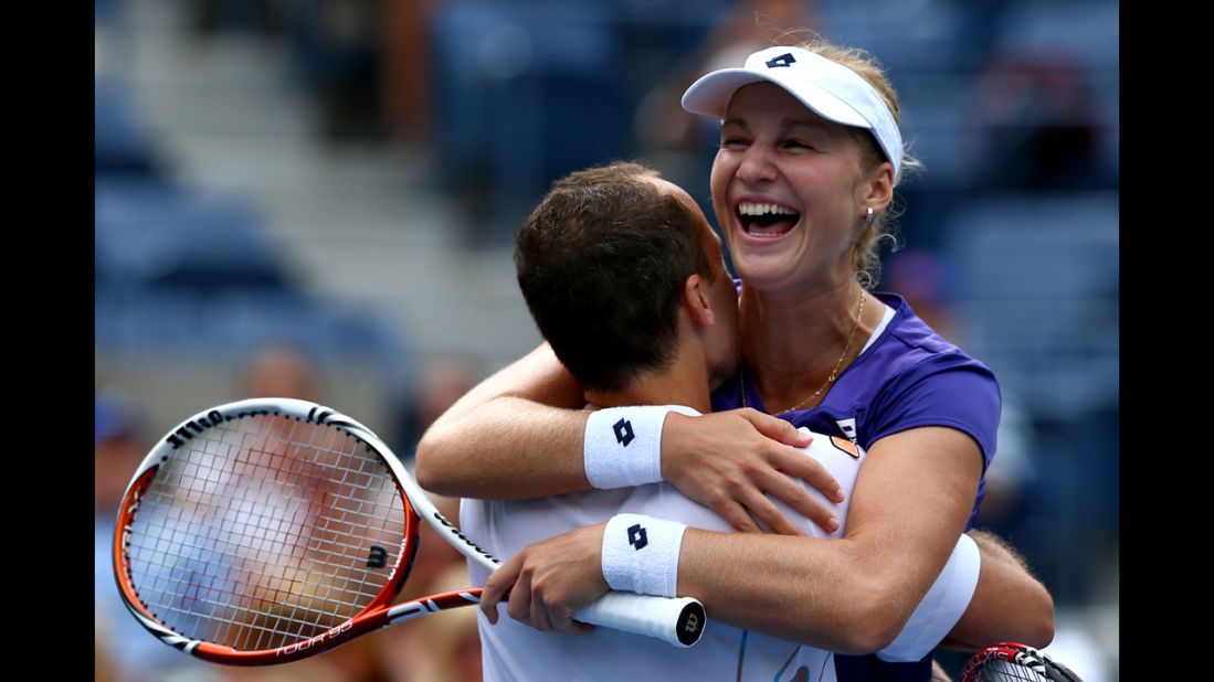 Ekaterina Makarova of Russia and Bruno Soares of Brazil celebrate after defeating Kristyna Pliskova of the Czech Republic and Marcin Matkowski of Poland to win their mixed doubles final match on Thursday.