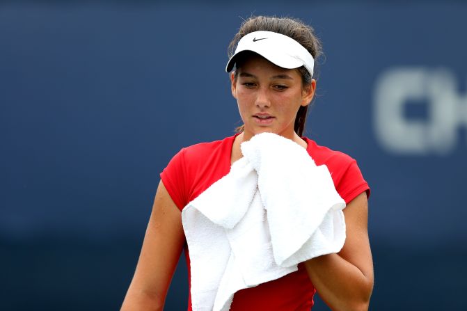 Ipek Soylu of Turkey wipes her face during a break against American Chalena Scholl during their girl's juniors singles match on Thursday. 