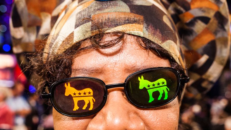 Julia Hicks of Colorado arrives early with some retro glasses at the Democratic convention on Thursday.