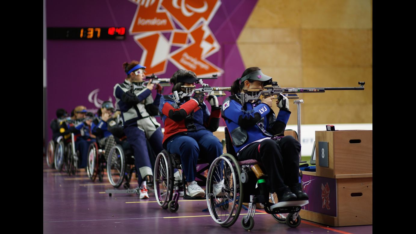 Yoojeong Lee of the Republic of Korea, right, shoots during the women's R8-50m rifle 3 positions-SH1 final on Thursday.