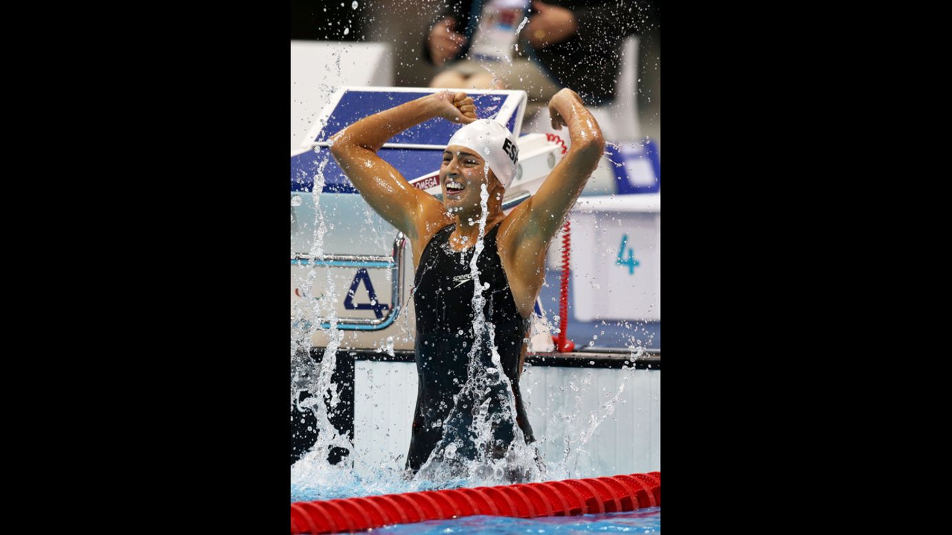Michelle Alonso Morales of Spain celebrates after winning gold in the women's 100m breaststroke - SB14 final on Thursday.