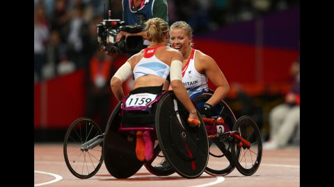 Gold medalist Hannah Cockroft of Great Britain is congratulated by Melissa Nicholls of Great Britain on Thursday.
