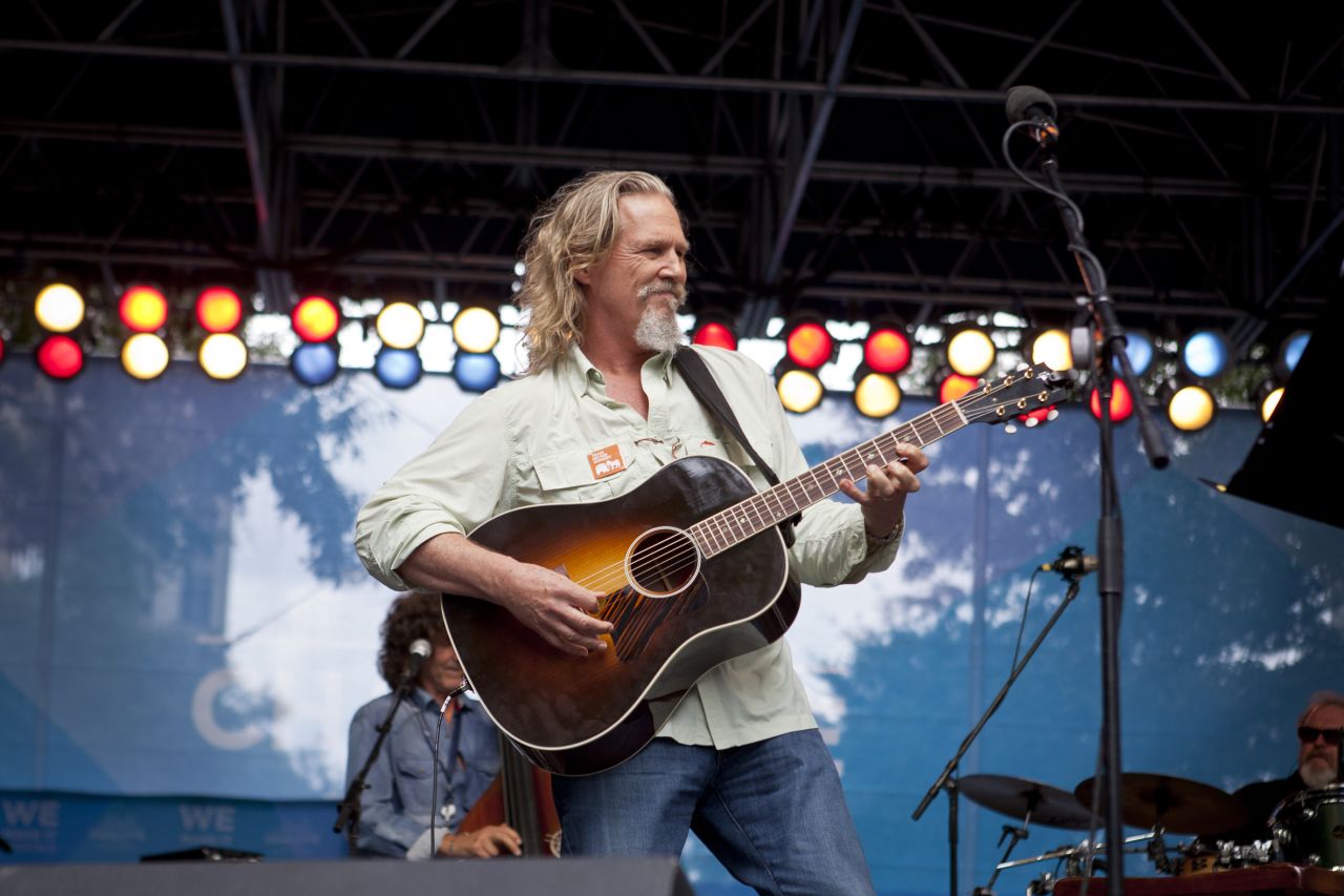 Actor and musician Jeff Bridges performs for the convention crowd. Bridges, an Obama supporter, also attended and performed in Tampa, Florida, last week during the Republican National Convention seeking support for his fight against child hunger. 