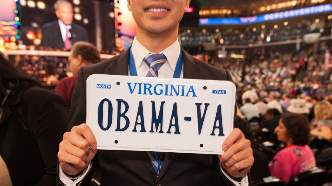 A man shows off an authentic Virginia Obama car plate on Wednesday.