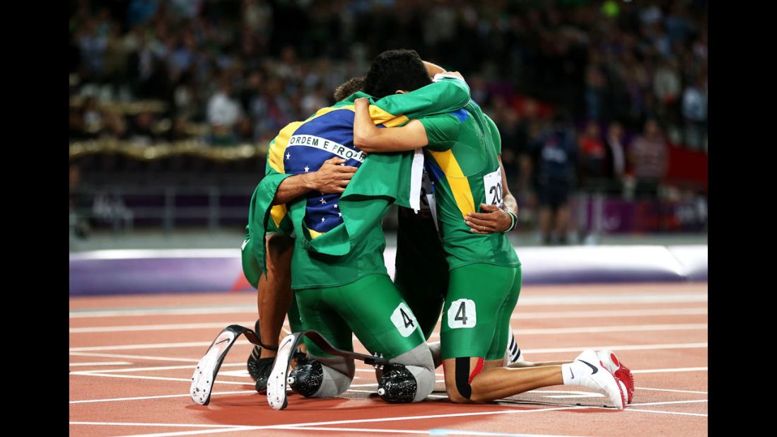 Members of the Brazilian team huddle after the men's 4x100-meter relay T42/T46 final on Thursday. 