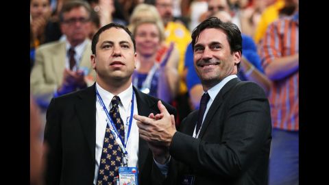 Actor Jon Hamm, right, attends the final day of the Democratic National Convention on Thursday.