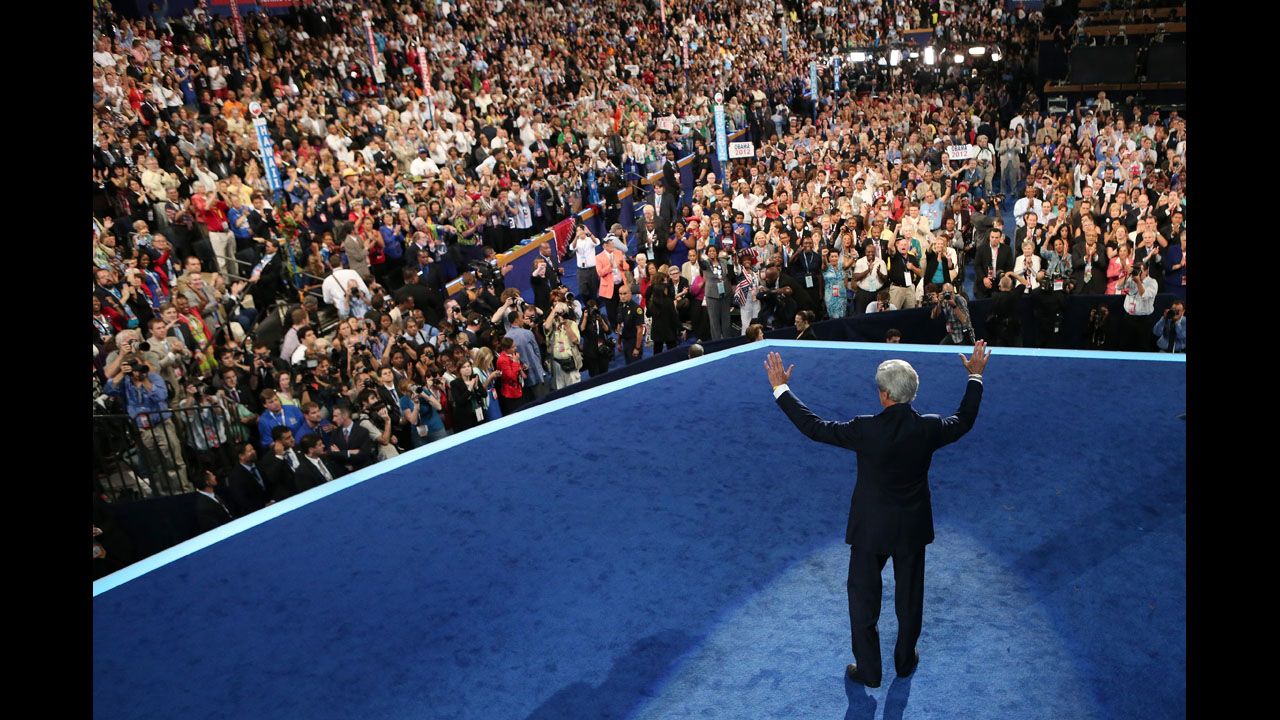 U.S. Sen. John Kerry of Massachusetts waves onstage Thursday.