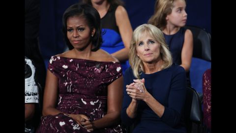 First lady Michelle Obama sits with Dr. Jill Biden on Thursday as Joe Biden accepts the vice presidential nomination. 