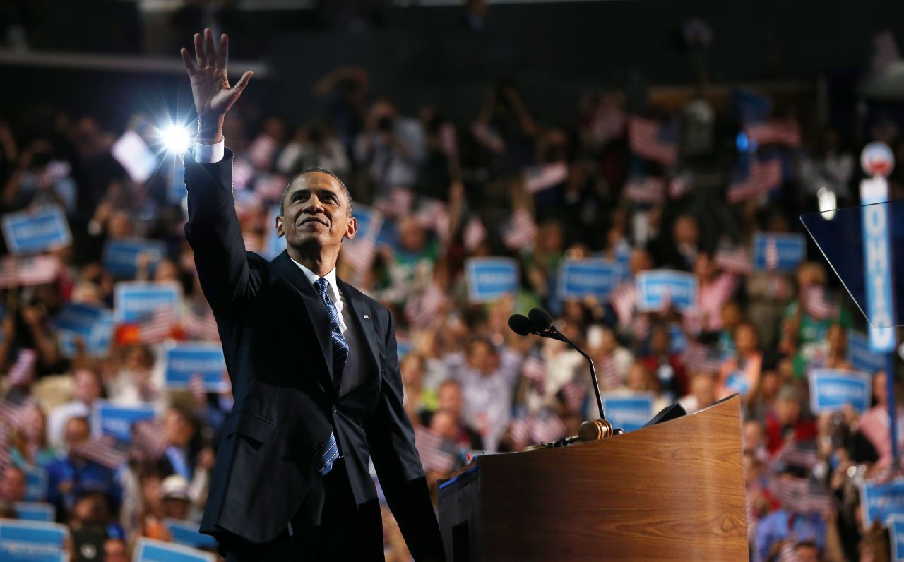 Barack Obama waves from the stage on Thursday.
