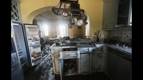 Mud coats the kitchen of the flooded Mary Plantation House, the oldest structure in Louisiana's Plaquemines Parish, on Thursday, September 6. At least 13,000 homes were damaged throughout Louisiana after Hurricane Isaac came ashore last week, a state official estimates.