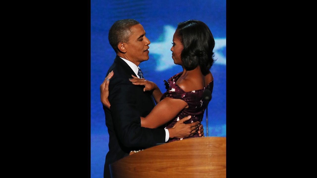 Barack Obama embraces his wife, Michelle, after giving his acceptance speech on Thursday.