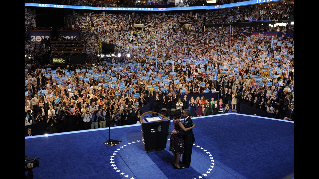 U.S. President Barack Obama kisses first lady Michelle Obama after giving his acceptance speech on Thursday.